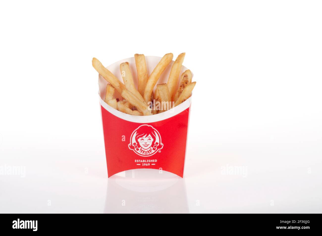 Wendy's French Fries or Chips in Container on white Stock Photo Alamy