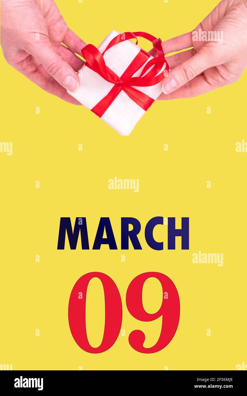 March 9th. Festive Vertical Calendar With Hands Holding White Gift Box