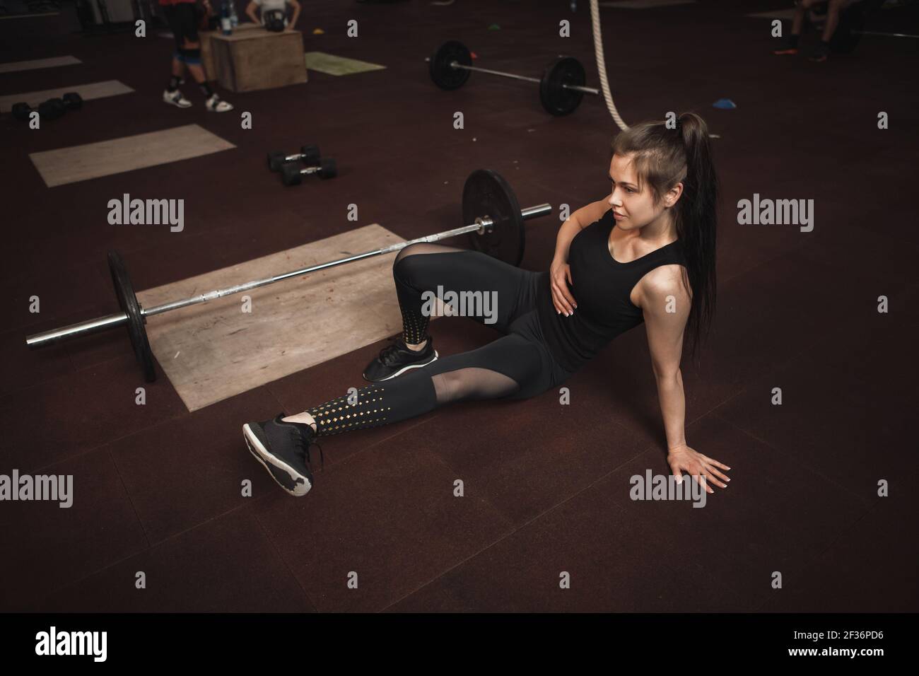 Sportswoman doing core workout at the gym Stock Photo