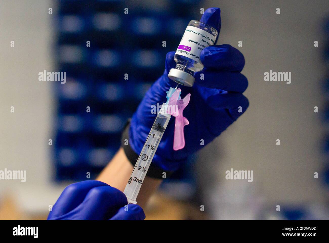 A healthcare worker prepares a syringe with the Astra Zeneca Covid19 dose at Coria City Hospital. Some European countries have cancelled the administration of AstraZeneca vaccine due the appearance of some side effects in people who had received it recently. Stock Photo