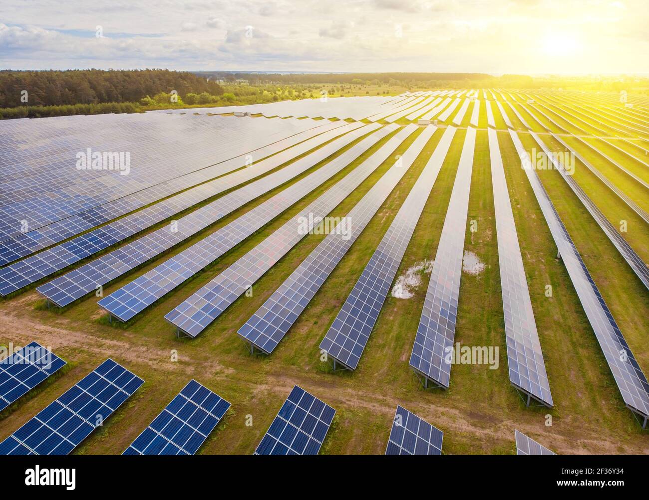 Solar power plant in the field. Aerial view of Solar panels. Solar farm