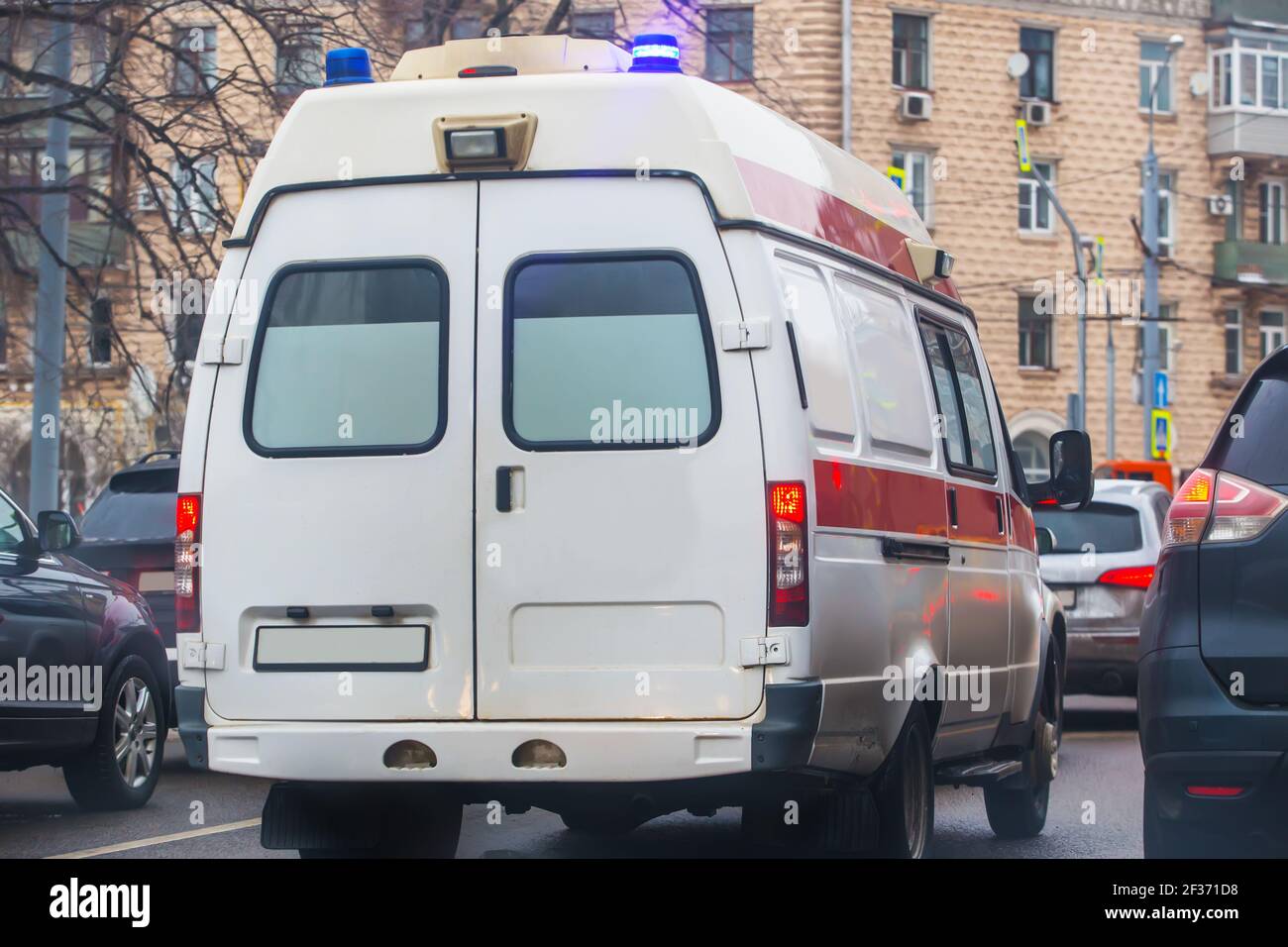 ambulance on the city street in a traffic jam Stock Photo Alamy