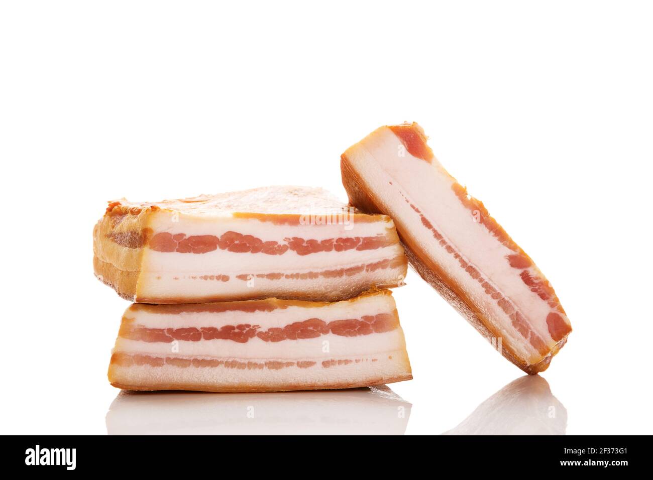 Bacon isolated on white background. Luxurios meat eating background. Stock Photo