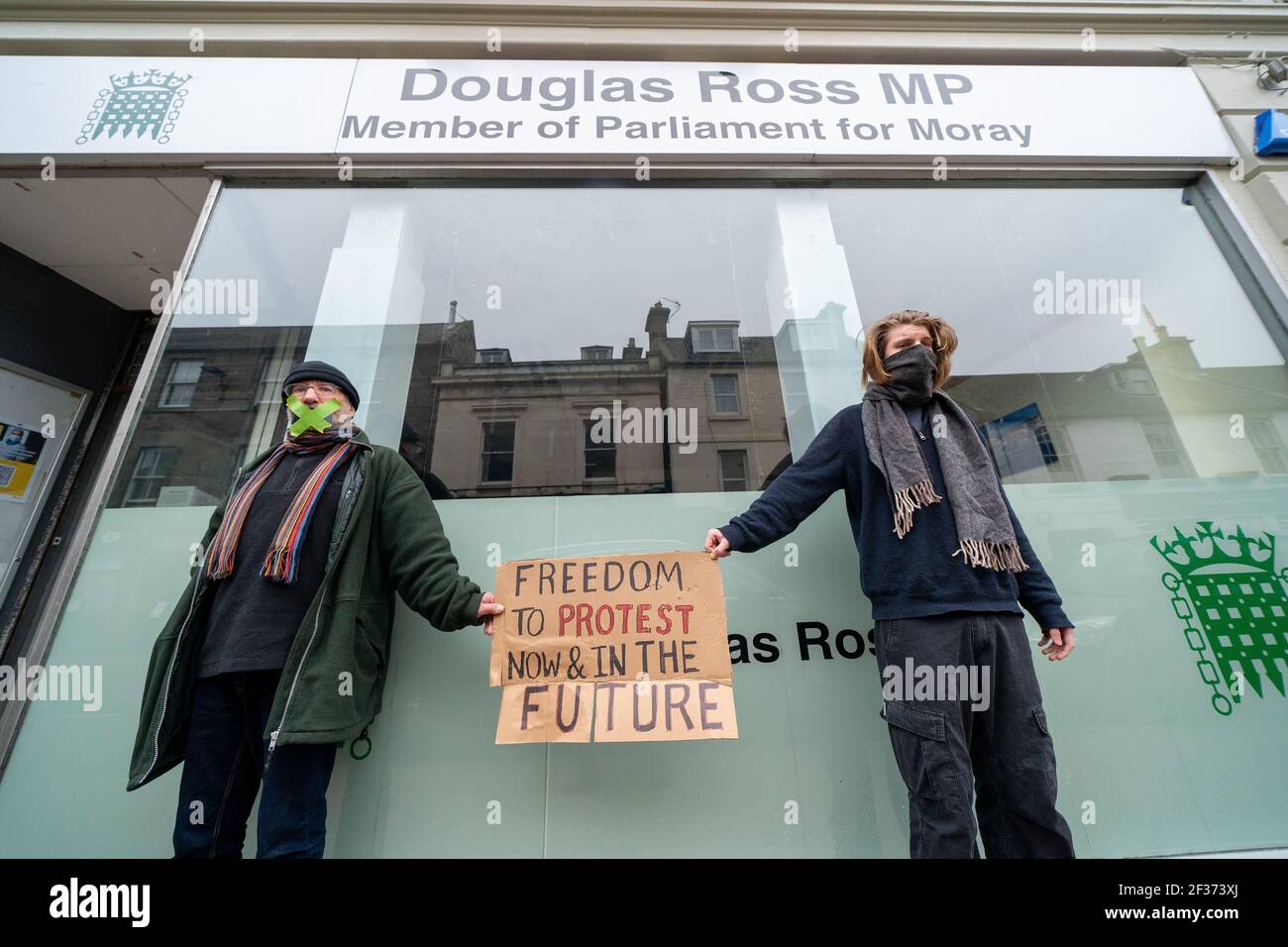 Outside MP Douglas Ross Office, High Street, Forres, Moray, UK. 15th Mar, 2021. UK. These are members from various groups in the Forres area protesting relative to the Police Bill and Freedom to Protest. Credit: JASPERIMAGE/Alamy Live News Stock Photo