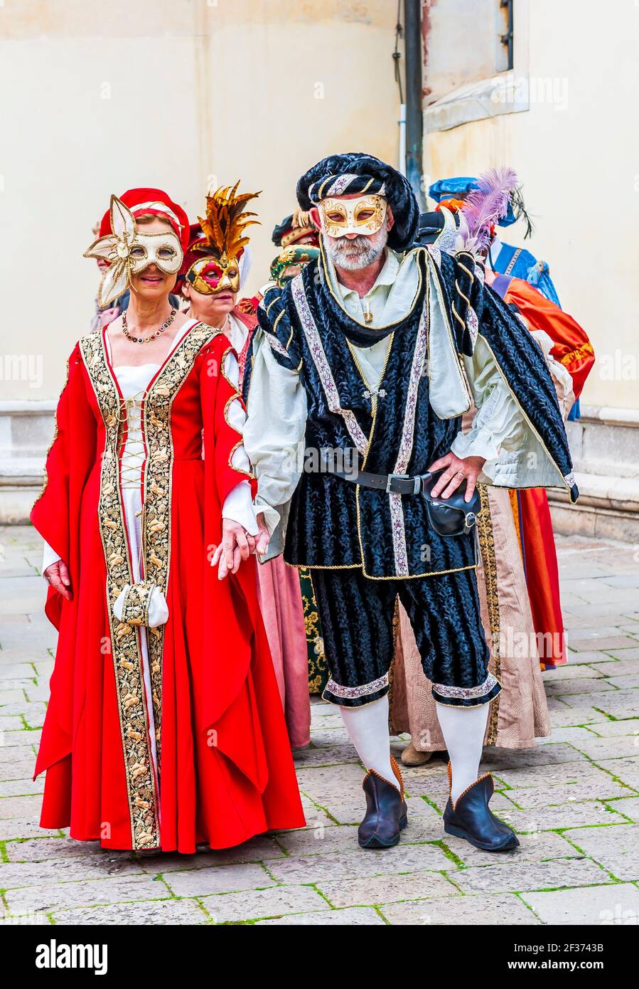 Colorful costume during the famous carnival in Venice in Veneto, Italy Stock Photo