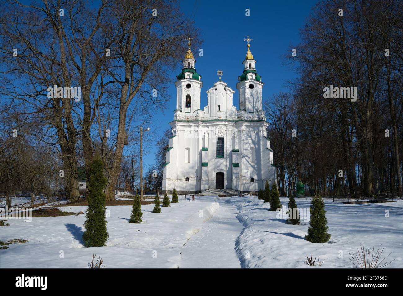 Ancient orthodox church of the Holy Trinity against a winter landscape, Volno village, Baranovichi district, Brest region, Belarus. Stock Photo