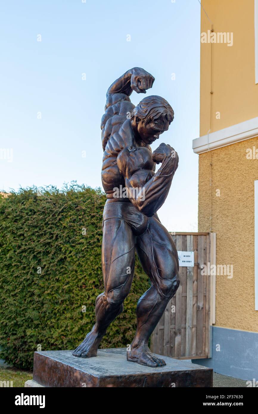 THAL, AUSTRIA - MARCH 6, 2021: Statue of Arnold Schwarzenegger in front of his museum Stock Photo