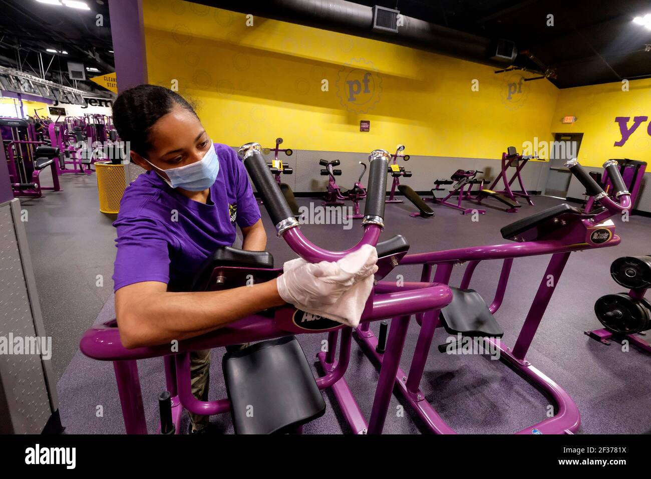 https://c8.alamy.com/comp/2F3781X/los-angeles-california-usa-15th-mar-2021-a-planet-fitness-staff-cleans-gym-equipment-to-prepare-the-reopening-after-being-closed-due-to-covid-19-pandemic-in-inglewood-california-on-march-15-2021-los-angeles-county-restaurants-can-again-welcome-customers-indoors-and-movie-theaters-and-fitness-centers-are-able-to-reopenall-at-limited-capacity-with-the-county-advancing-today-to-the-less-restrictive-red-tier-of-the-states-blueprint-for-a-safer-economy-credit-ringo-chiuzuma-wirealamy-live-news-2F3781X.jpg