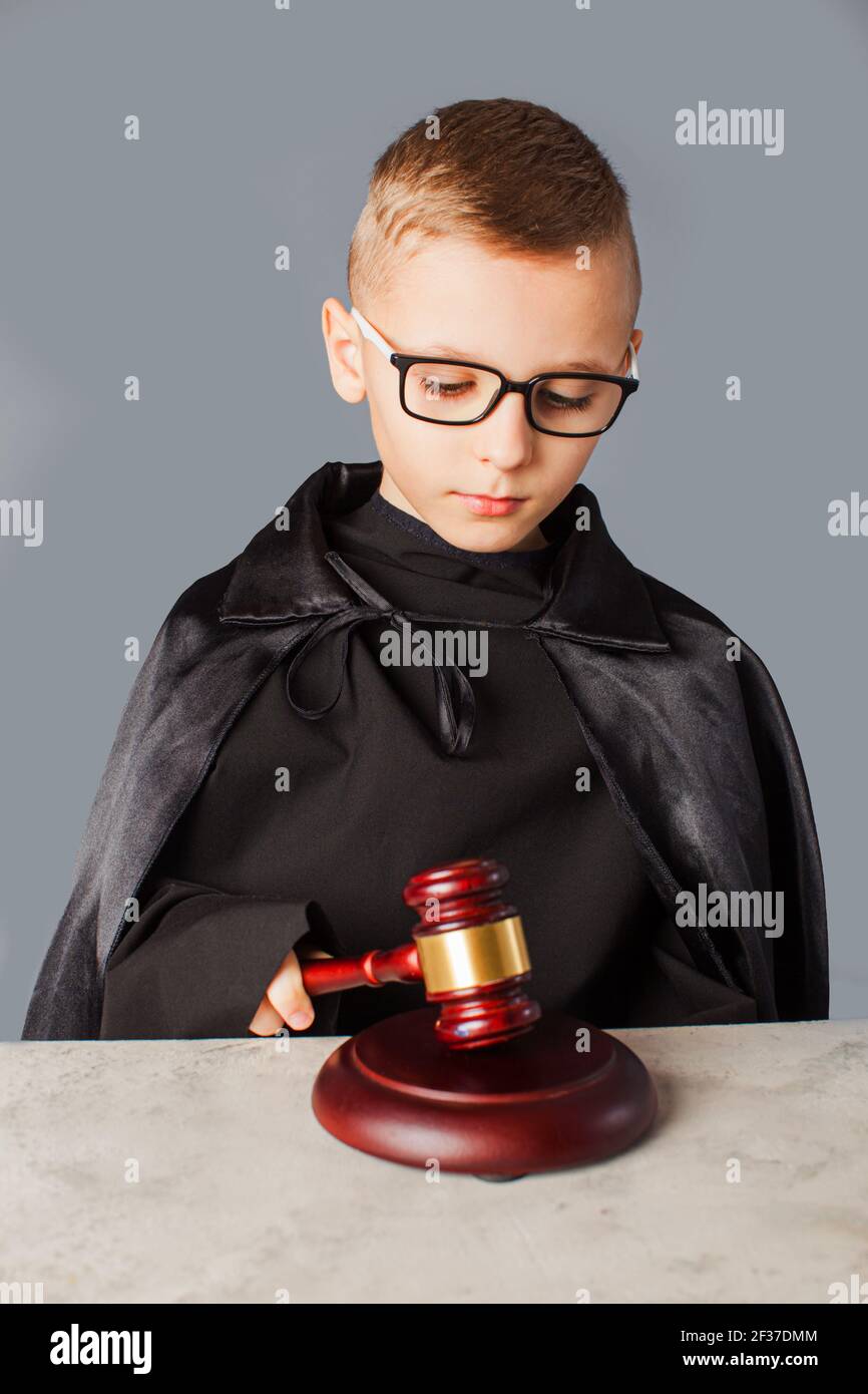 Portrait of serious boy judge makes a decision Stock Photo - Alamy