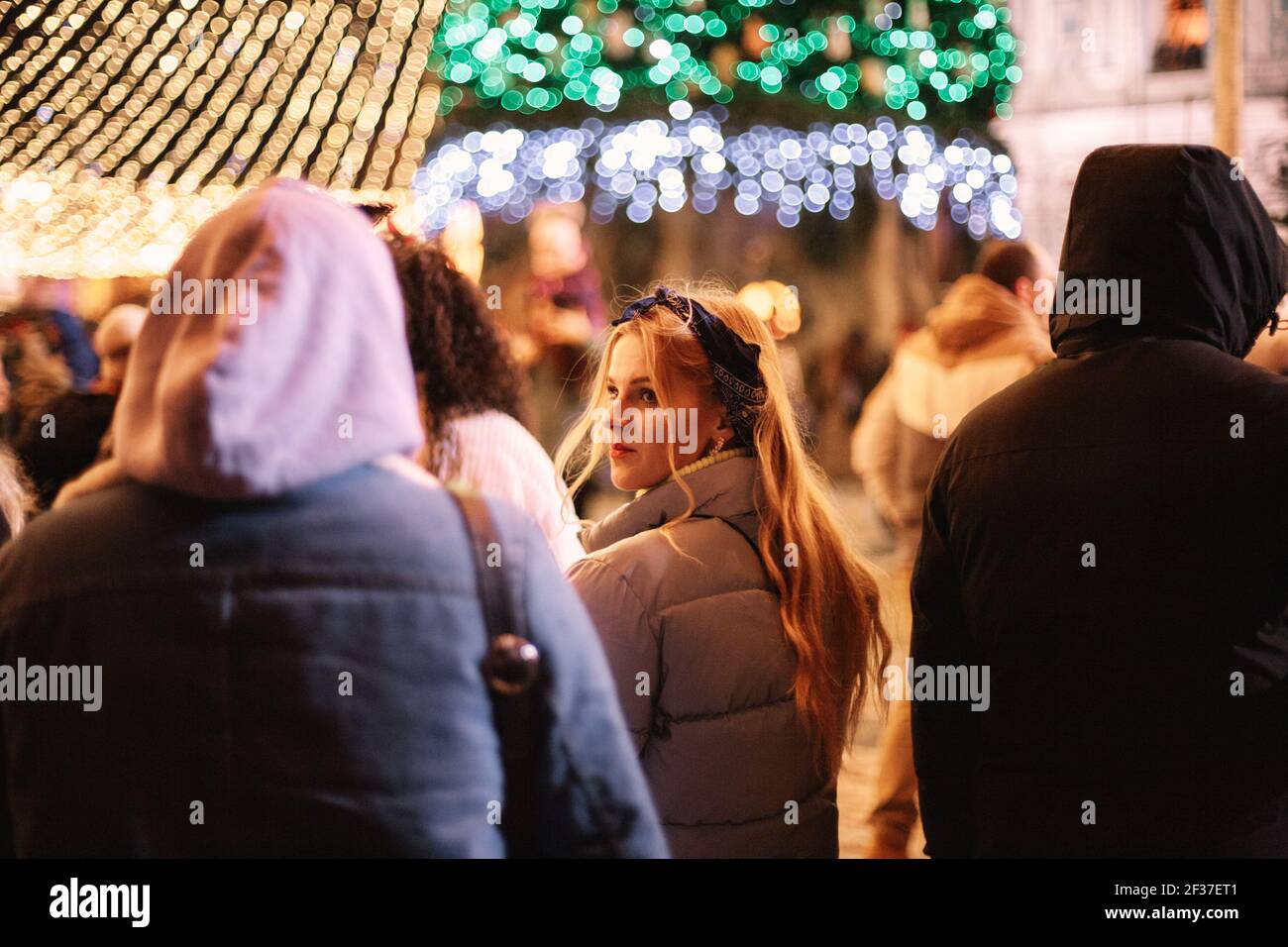 Woman walking at night rear view hi-res stock photography and images ...