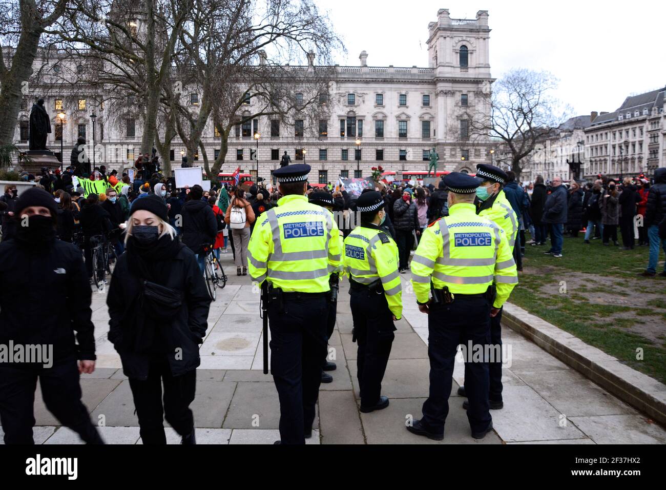 Police adopt a softer approach to managing a second vigil for Sarah Everard in Parliament Square, London 15th March 2021. Stock Photo