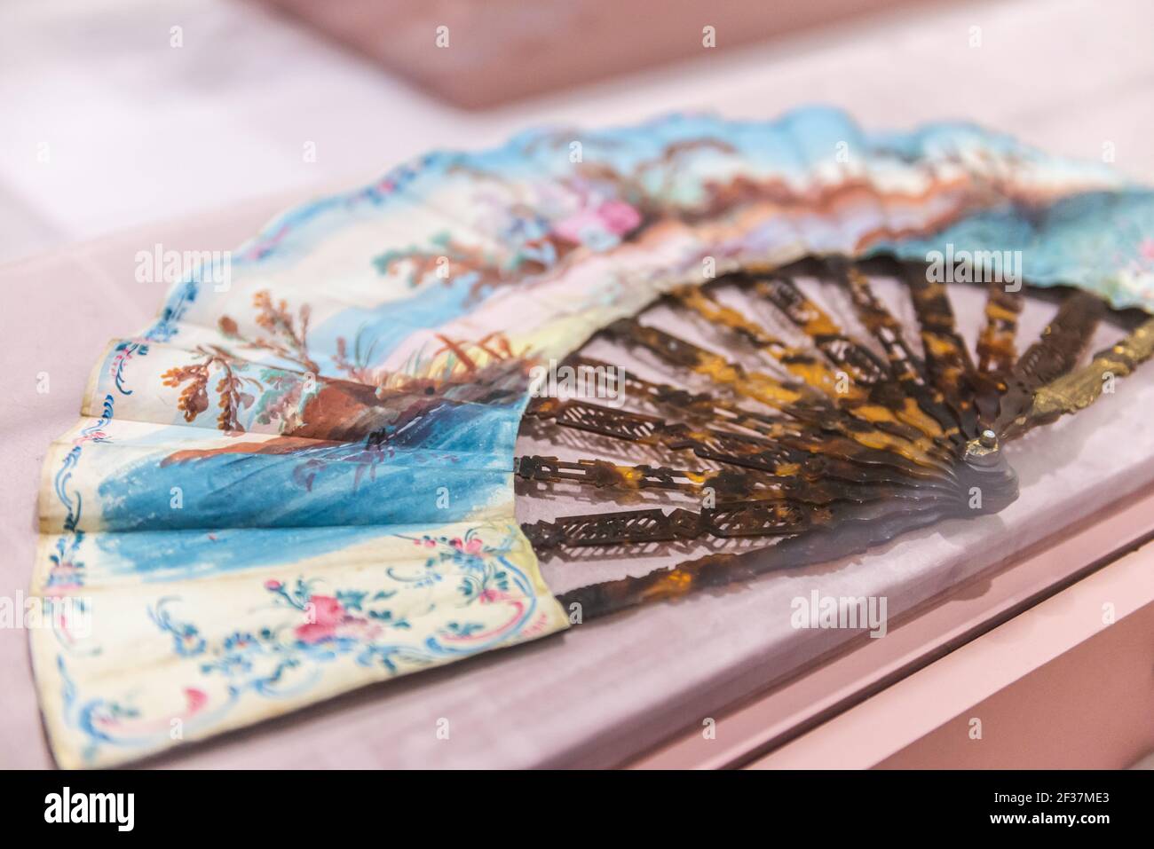 Beautiful antique fan. This fan was used more than 100 years ago. Stock Photo