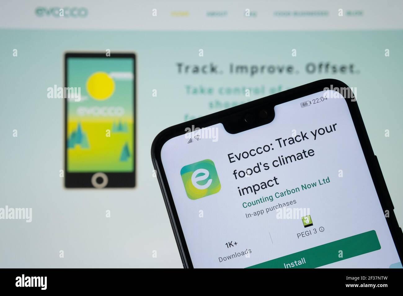 Evocco app for tracking food's climate impact and counting carbon foot print. Stafford, United Kingdom, March 15, 2021. Stock Photo