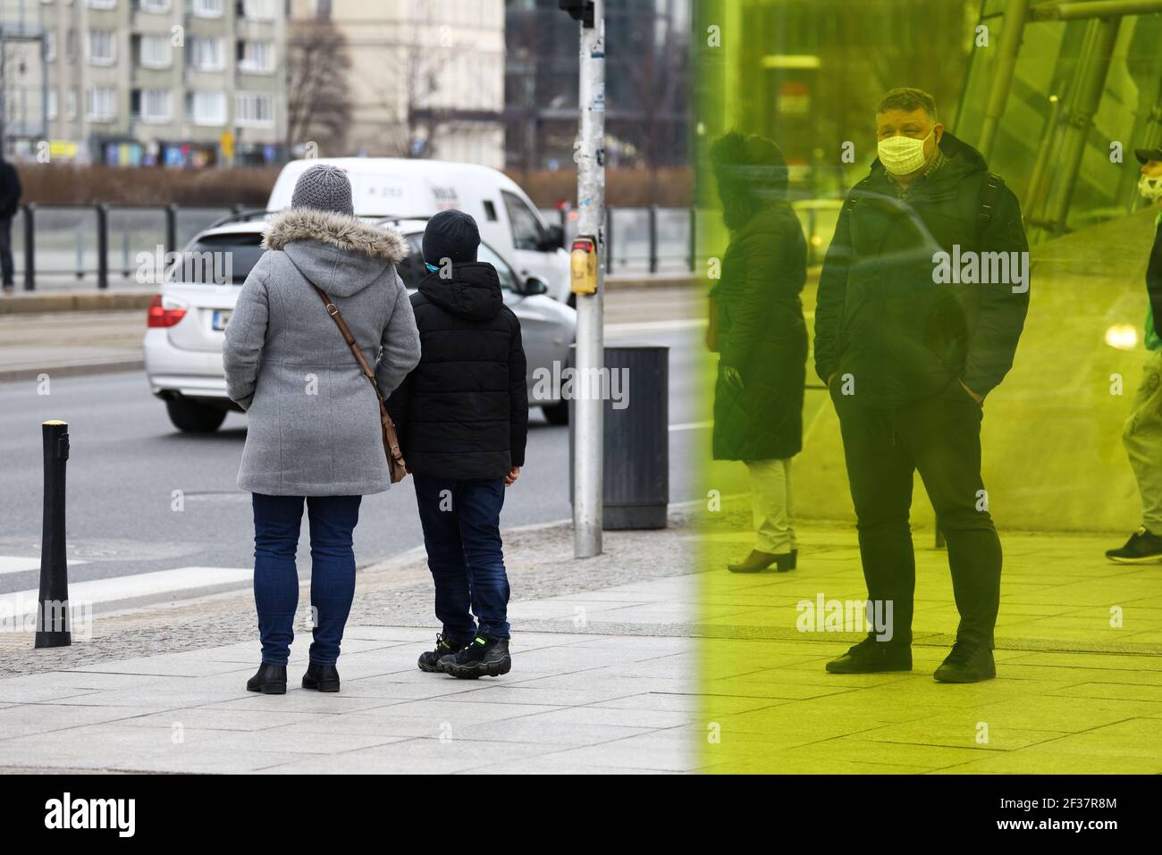 Warsaw, Poland. 15th Mar, 2021. A man wearing a face mask is seen in Warsaw, Poland, on March 15, 2021. The Polish government reintroduced lockdown measures in Warsaw on Monday. According to Polish Health Minister Adam Niedzielski, the lockdown is in force from March 15 to March 28. Hotels, cultural institutions and sports facilities are shut down and the operation of shopping centers is also be restricted. Credit: Jaap Arriens/Xinhua/Alamy Live News Stock Photo