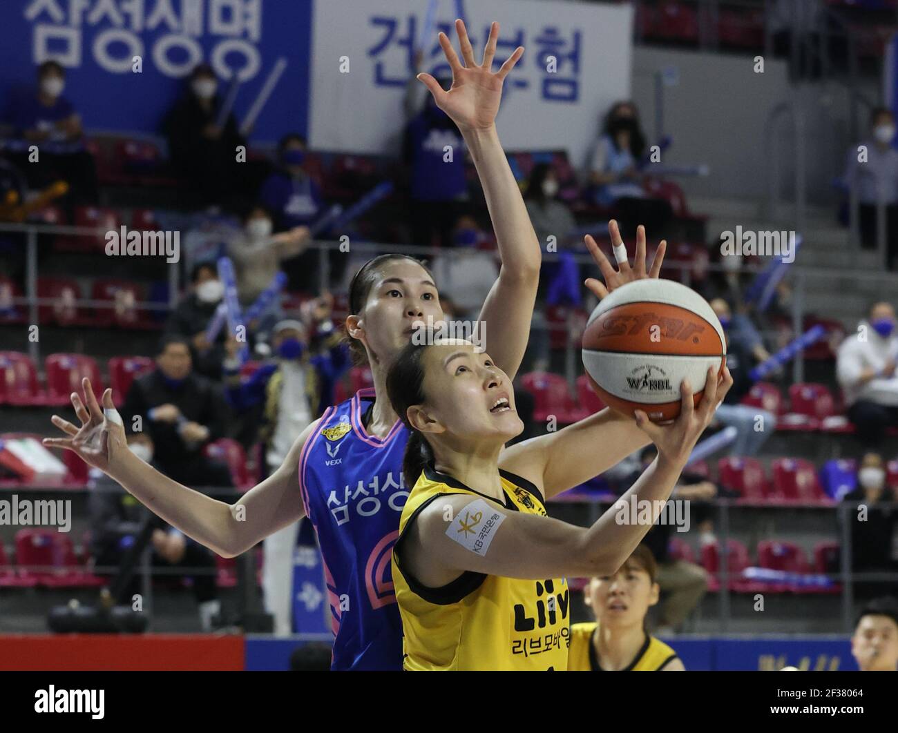 South Korea. 12th Mar, 2021. WKBL Finals Samsung Blue Minx's Yoon Ye-bin  dribbles the ball during Game 3 of the Women's Korean Basketball League  championship series against the Cheongju KB Stars at