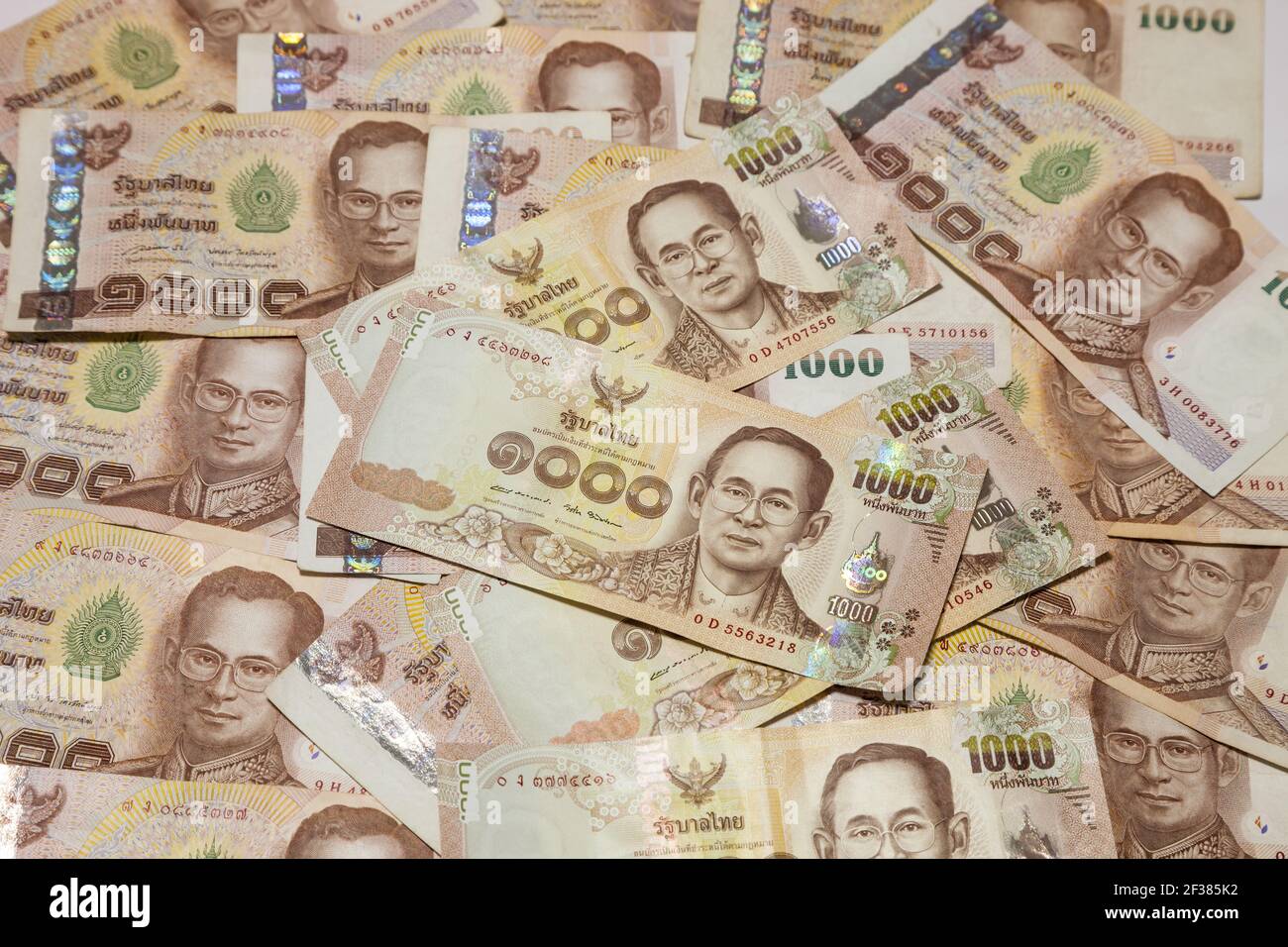 stack of Thai money banknotes baht on white background Stock Photo Alamy