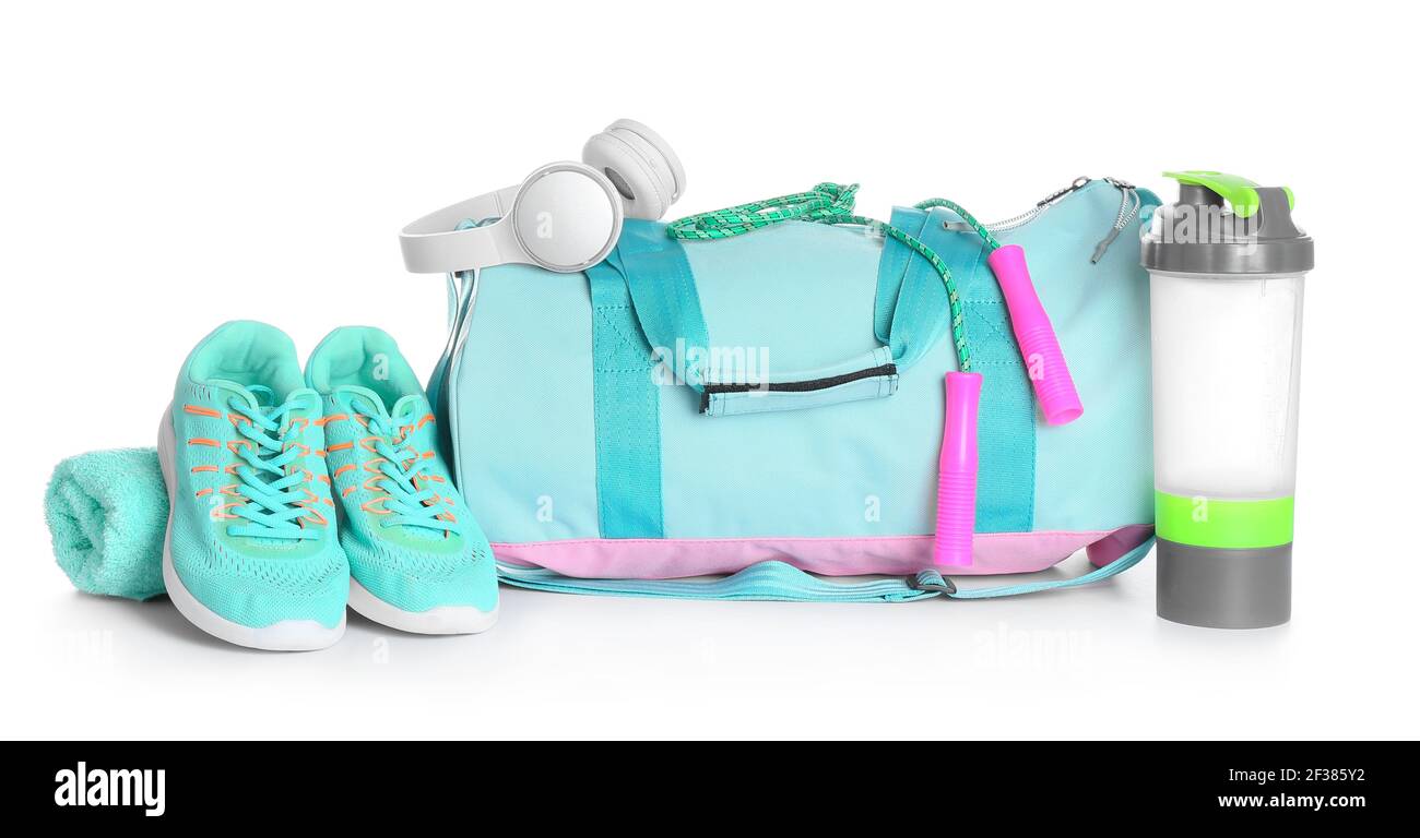 Composition with sports bag on white background Stock Photo - Alamy