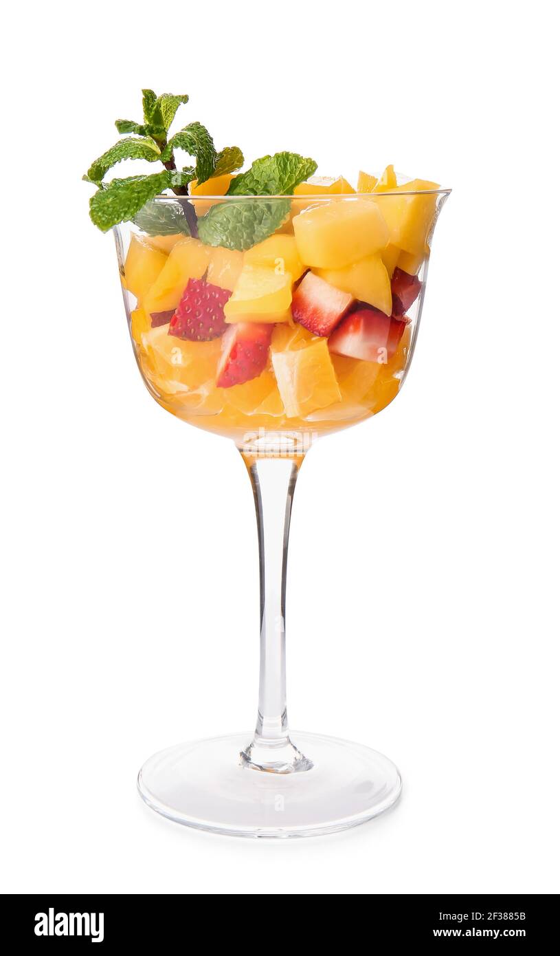 Glass bowl with tropical fruit salad on white background Stock Photo ...