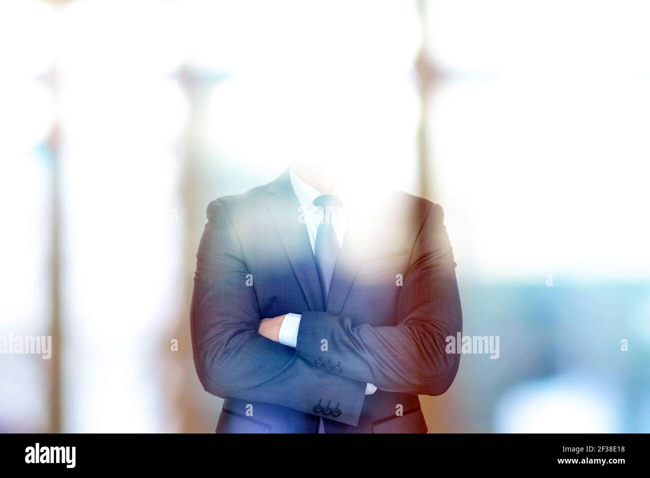 Anonymous businessman crossing his arms Stock Photo