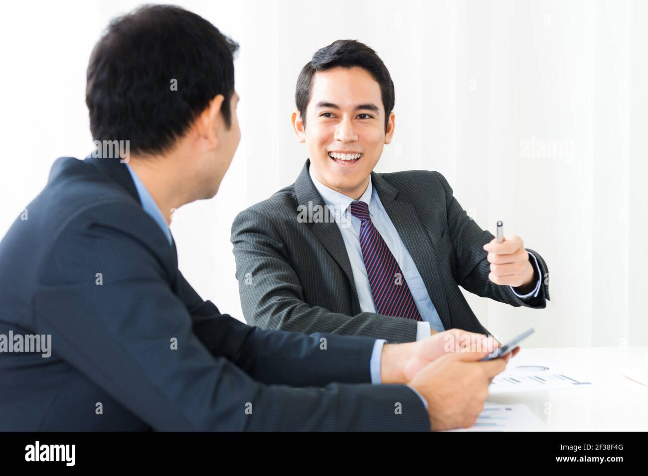 Happy businesspeople in the meeting Stock Photo