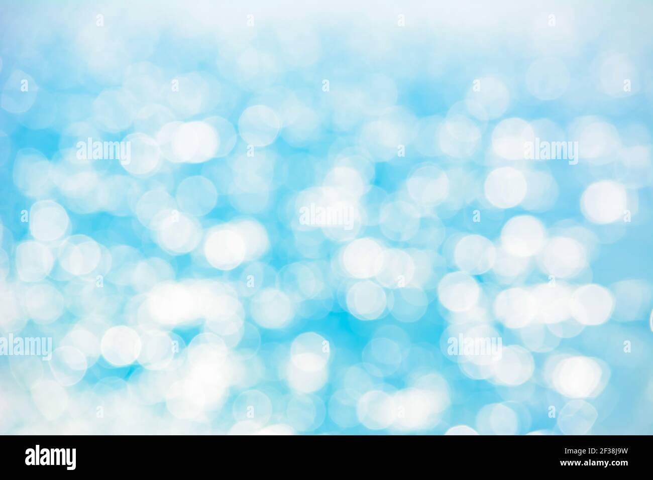White blue shiny bokeh abstract background Stock Photo