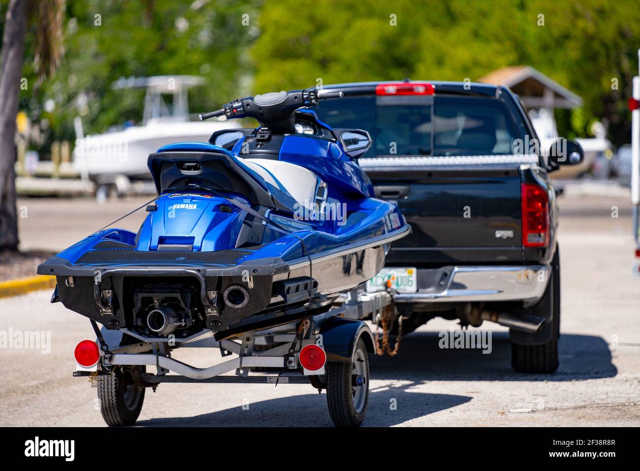 Truck towing a jet ski at the Haulover Marina Miami Beach FL Stock