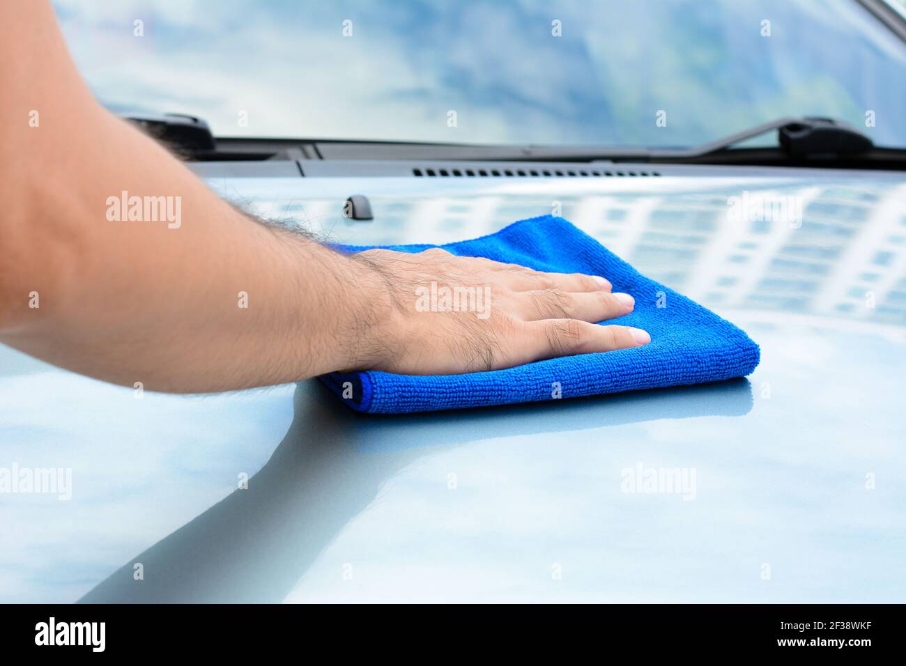 Hand polishing car with microfiber cloth Stock Photo Alamy