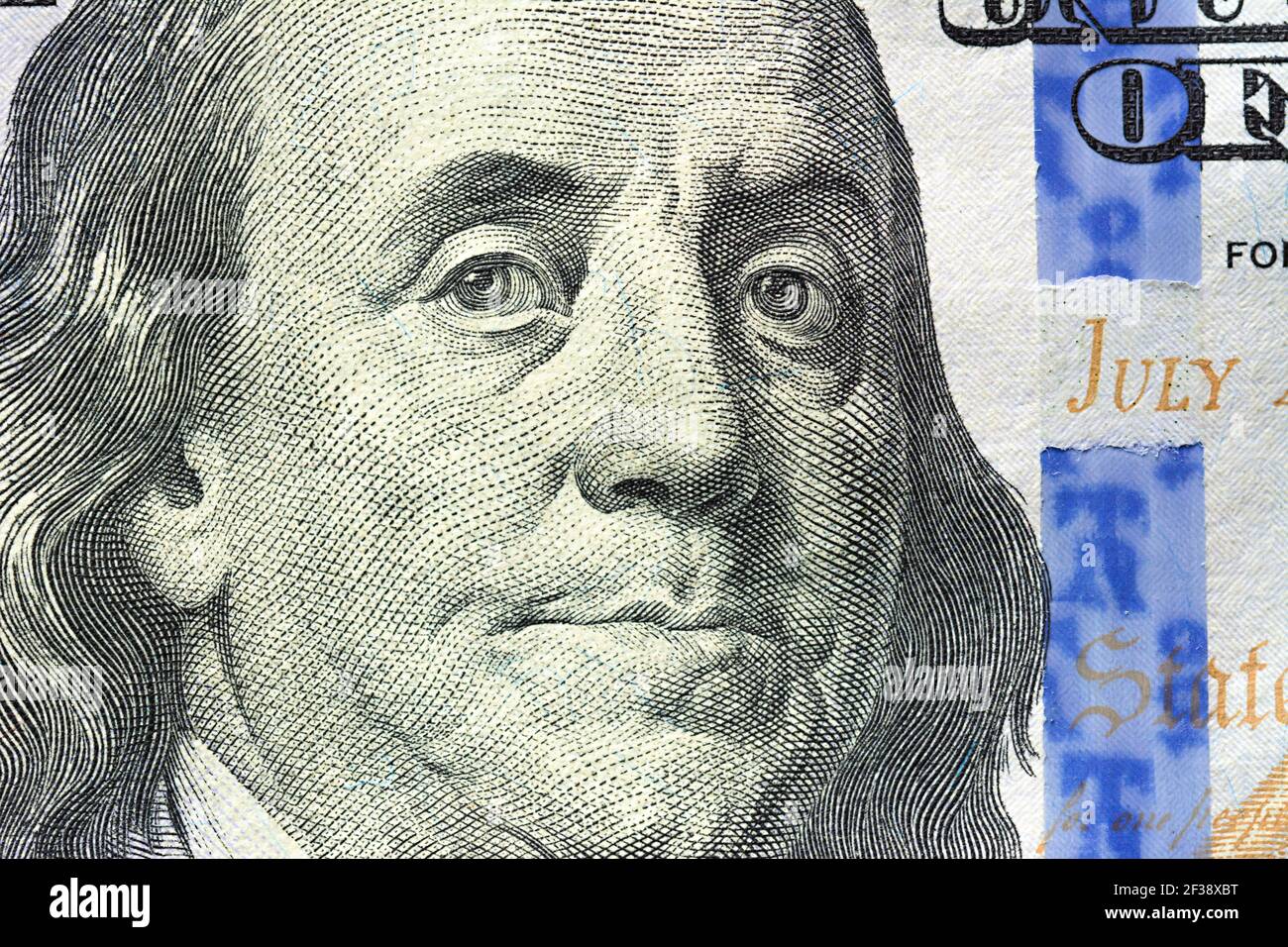 Close up of Benjamin Franklin face on 100 US dollar bill Stock Photo