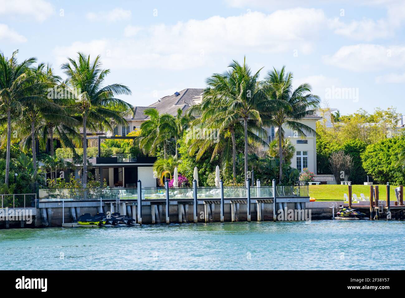 Waterfront realty Miami Beach with palm trees Stock Photo