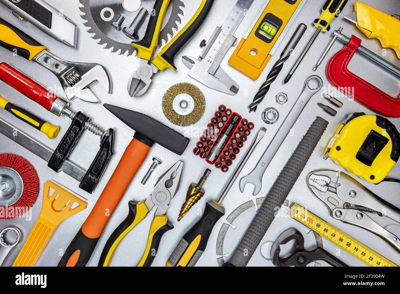 assorted work and home renovation tools. diagonal flat lay. concept industrial background Stock Photo