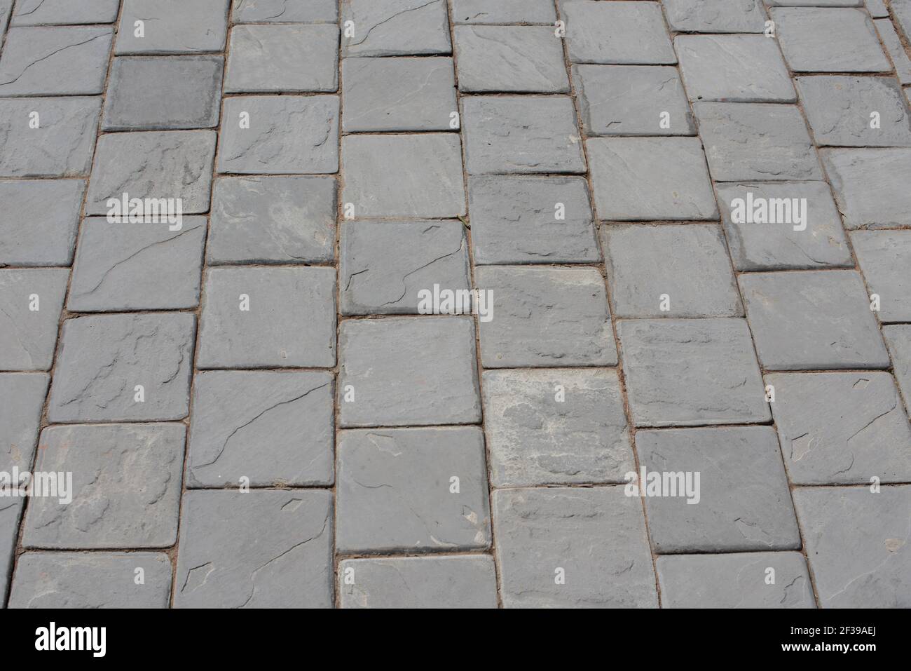 High angle view of paving on sidewalk  Stock Photo