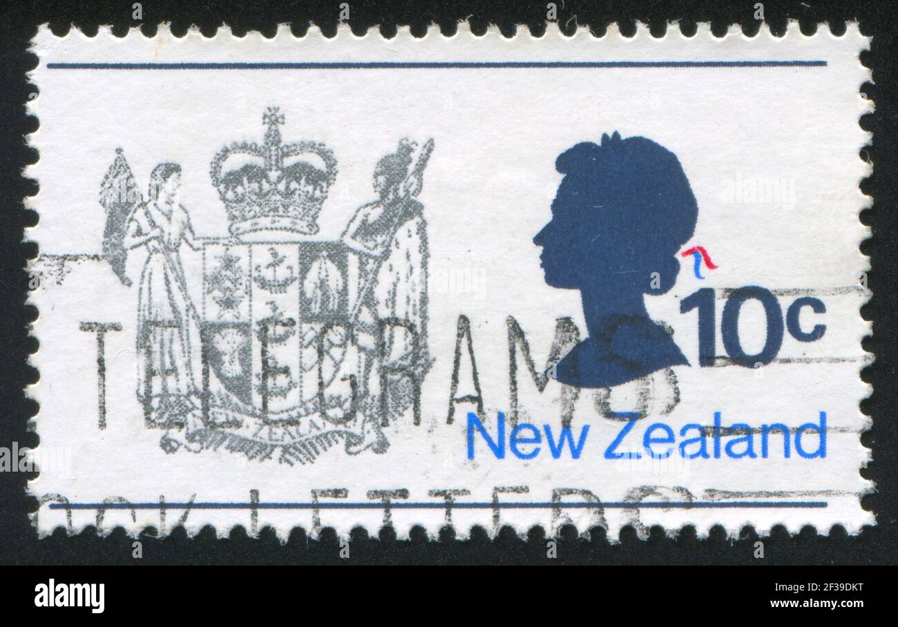 NEW ZEALAND - CIRCA 1970: stamp printed by New Zealand, shows New Zealand Coat of Arms and Queen Elizabeth II, circa 1970 Stock Photo