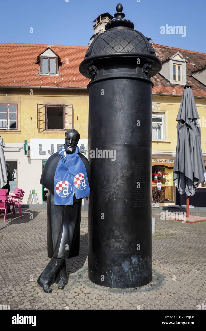 The monument August Senoa in Vlaska Street was covered with Dinamo scarf, before the football match between Dinamo and Krasnodar. Dinamo fans celebrat Stock Photo