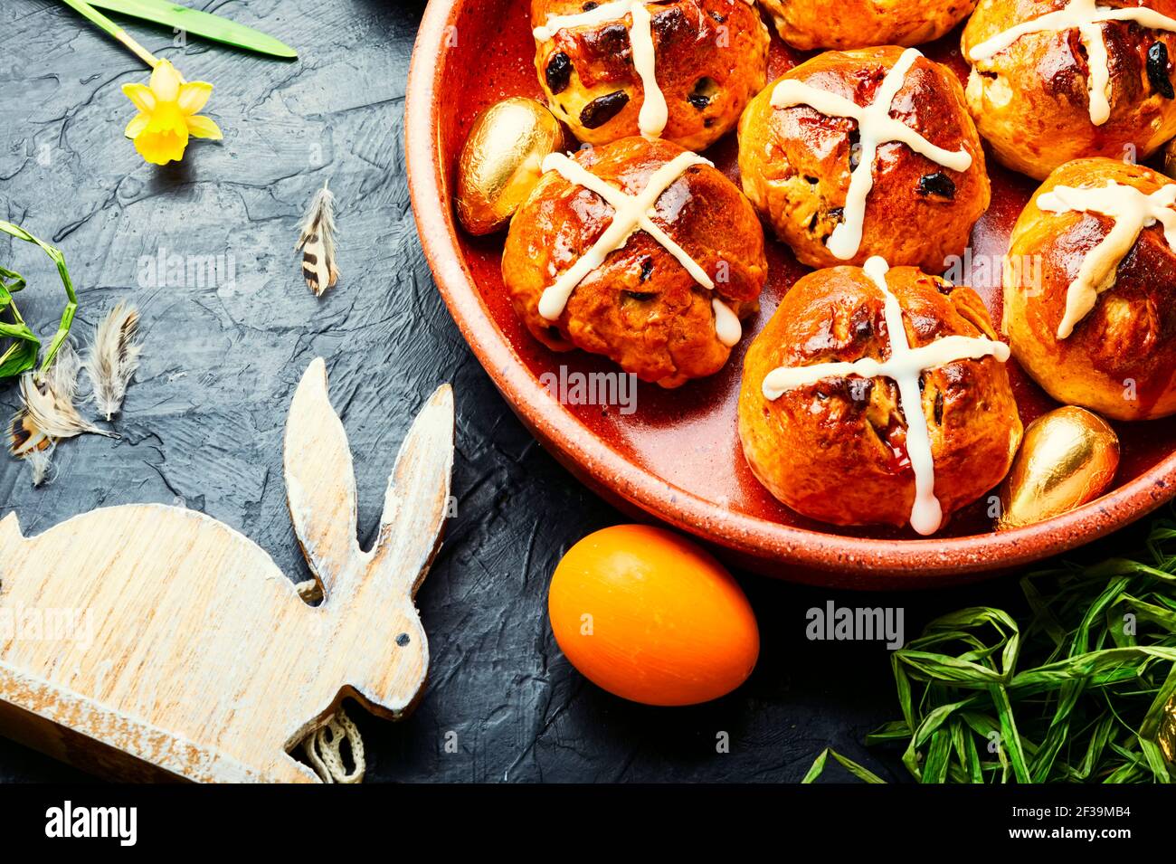 Easter hot cross buns and easter decor.Easter baked goods Stock Photo