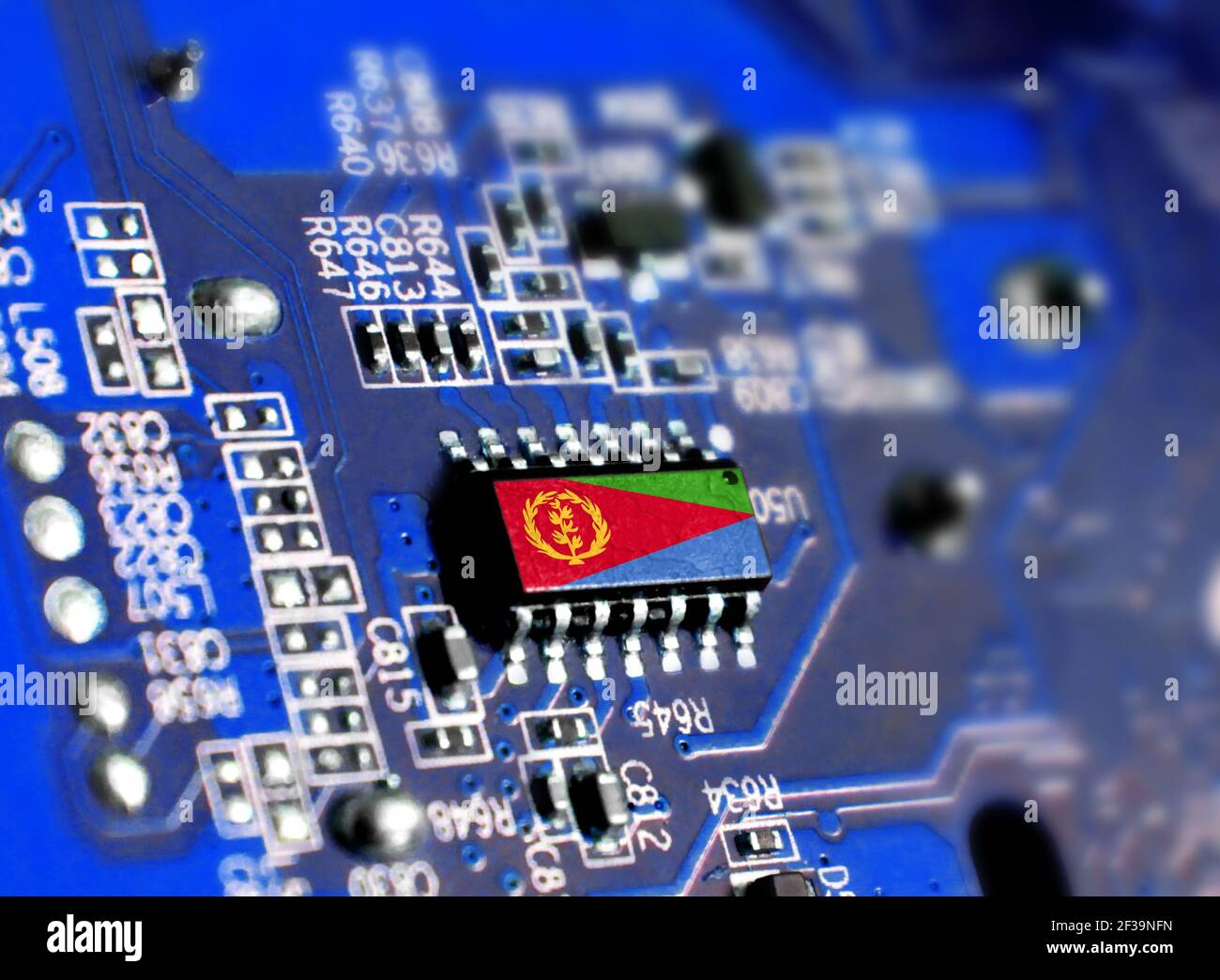 Electronic board with embedded microchip and shown flag of Eritrea. The ...