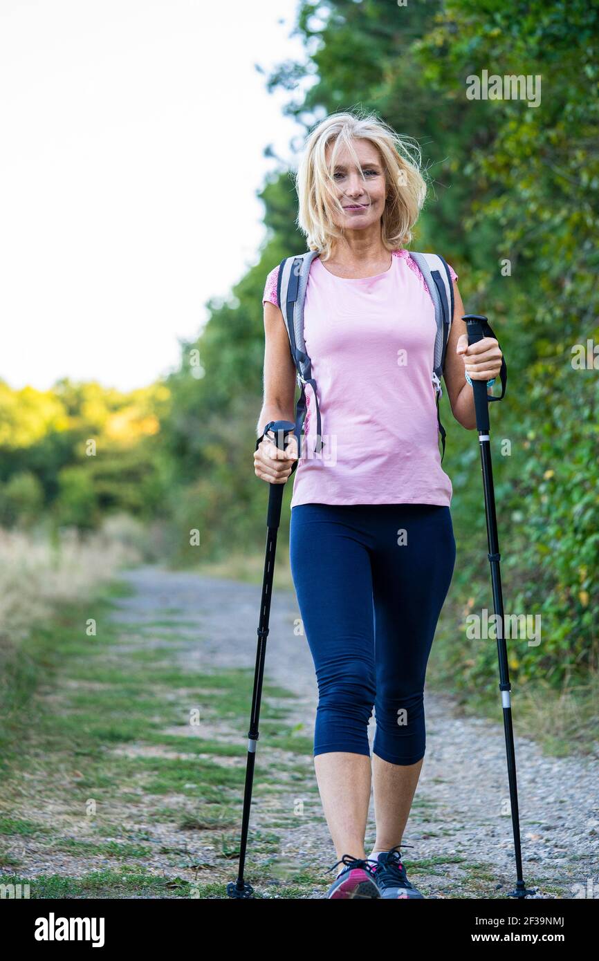 Power walking mature woman hi-res stock photography and images - Alamy