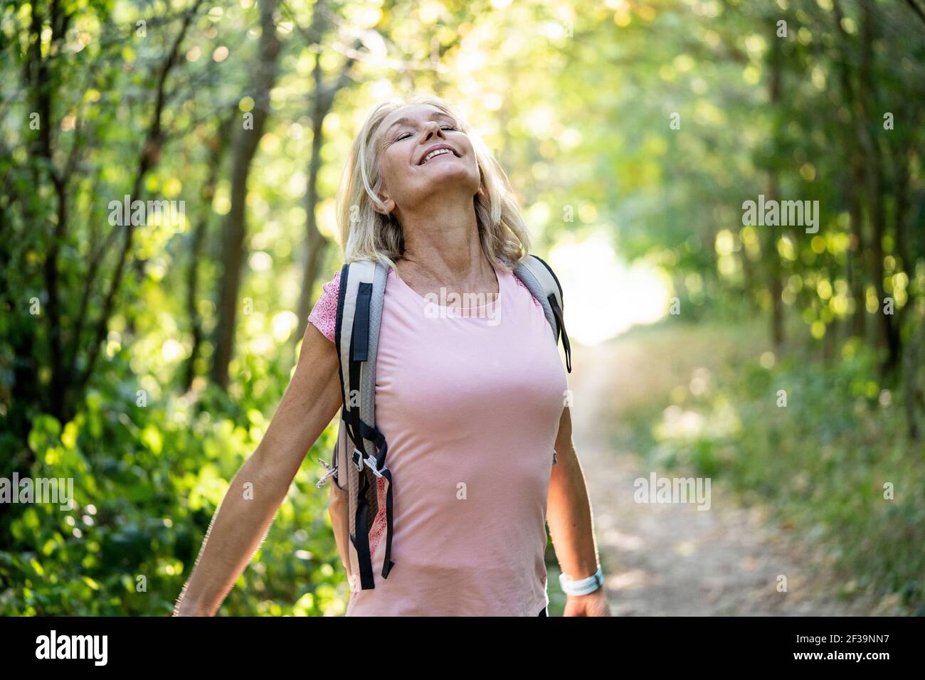 Joyful girl stretching arms hi-res stock photography and images - Alamy