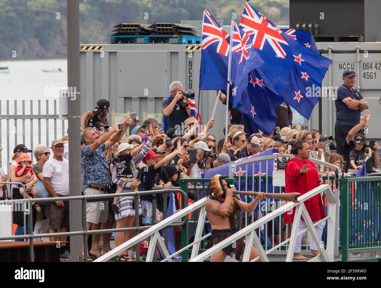 Auckland, New Zealand. 16th March, 2021. The 36th America's Cup presented by PRADA, New Zealand Supporters in the America's Cup Village and the Ngati Whatua Orakei Warrior blowing a conch. Auckland, New Zealand.16th March 2021. Credit: Neil Farrin/Alamy Live News Stock Photo
