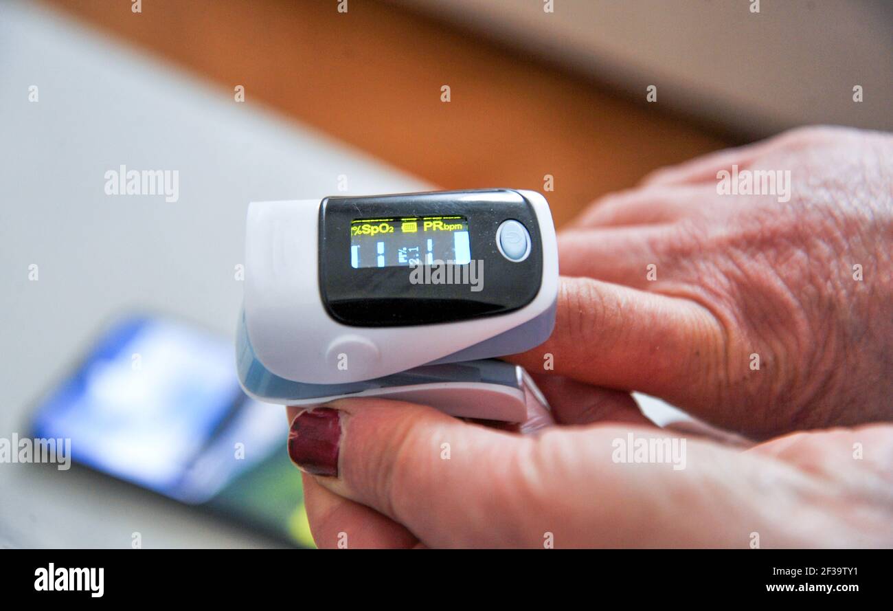 pulse oximeter used to measure pulse rate and oxygen levels Stock Photo
