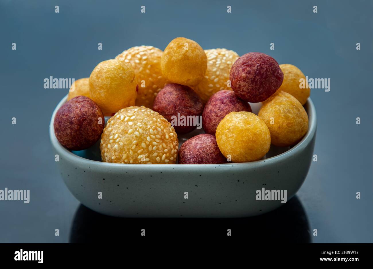 Fried Sweet Potato Balls with sesame with Deep fried purple and yellow