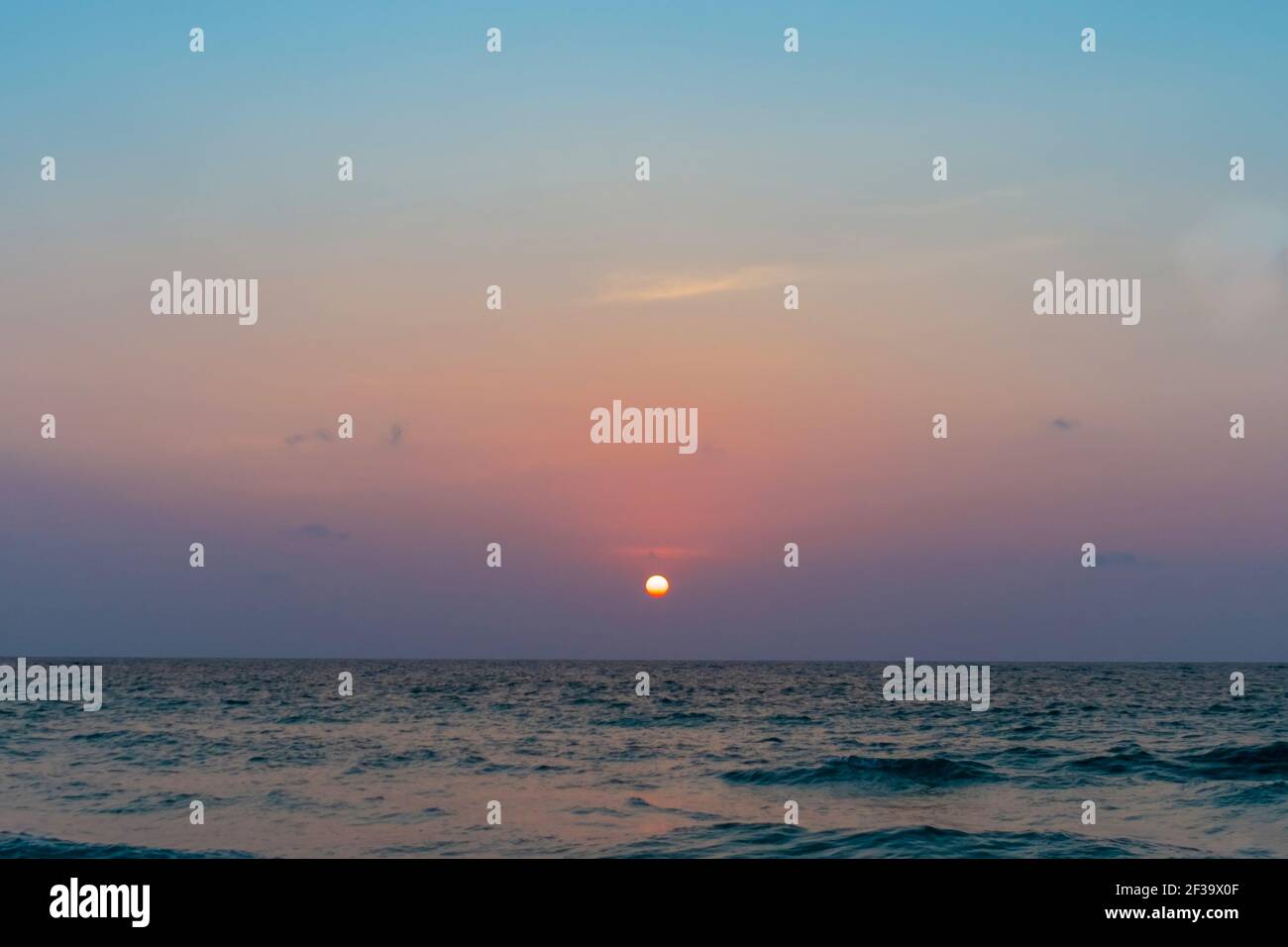 Colorful vibrant ocean sea wave beach summer with sunrise or sunset ...