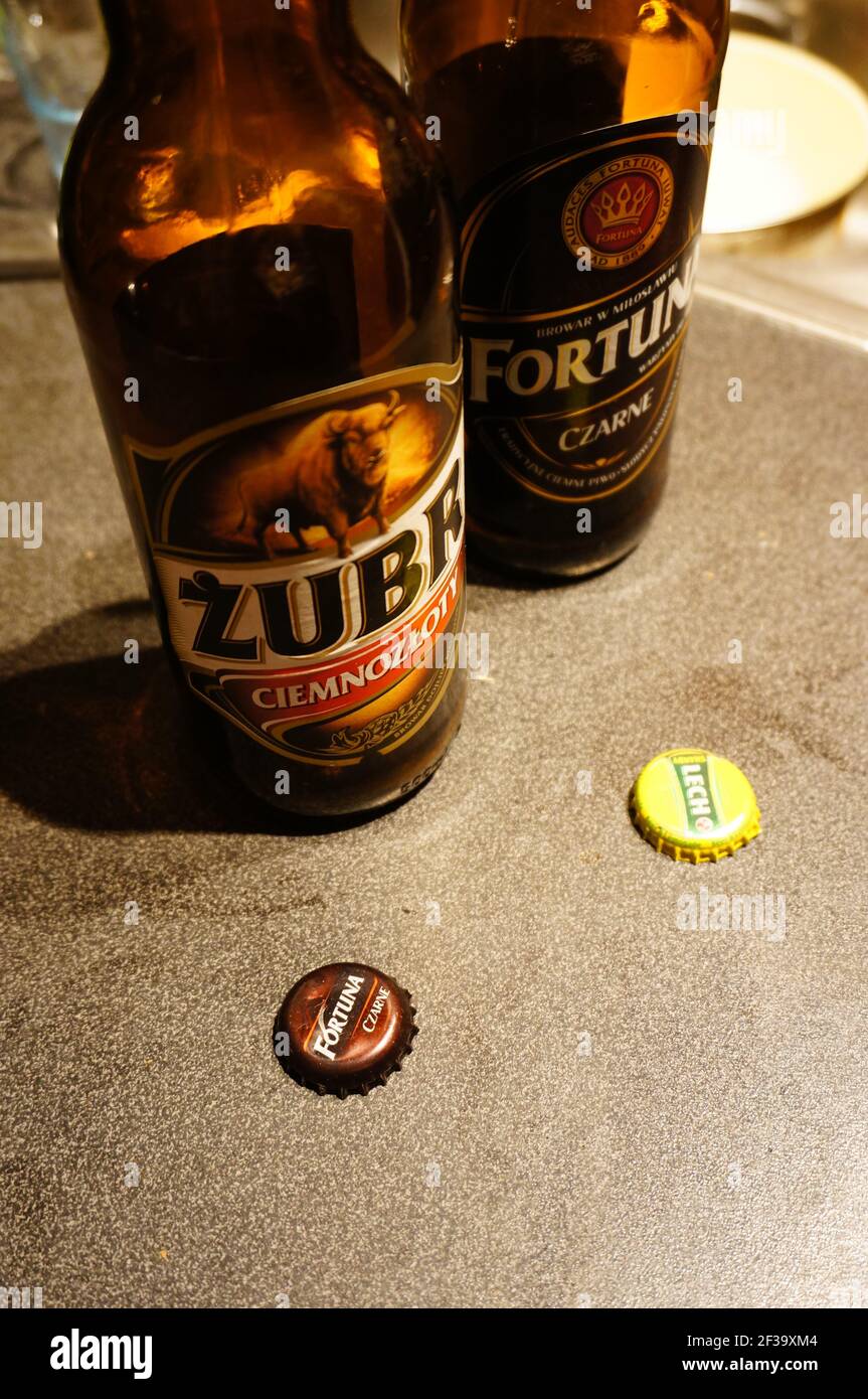 POZNAN, POLAND - Sep 04, 2013: Empty Polish beer bottles of the brands Zubr and Fortuna Stock Photo