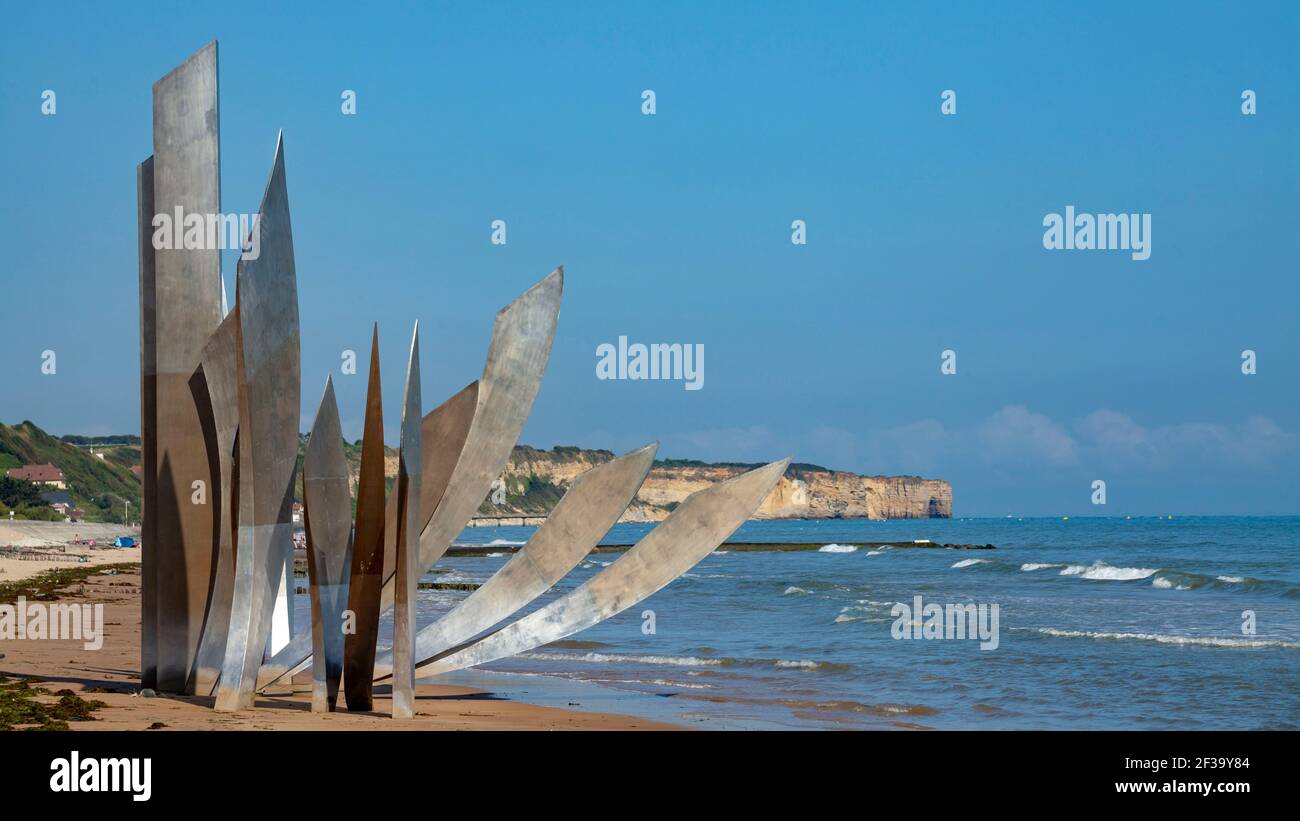 Sculpture 'The Braves', by sculptor Anilore Banon, erected on Omaha Beach to honor the American soldiers who were killed during the invasion of Norman Stock Photo