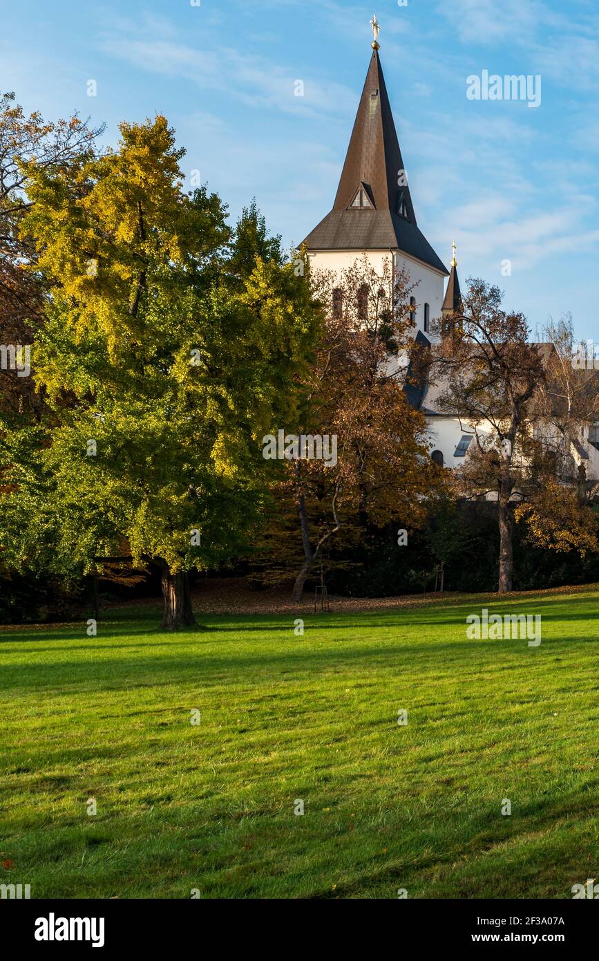 Kostel Povyseni sv. Krize church from Park Bozeny Nemcove public park in Karvina city in Czech republic during beautiful autumn day Stock Photo