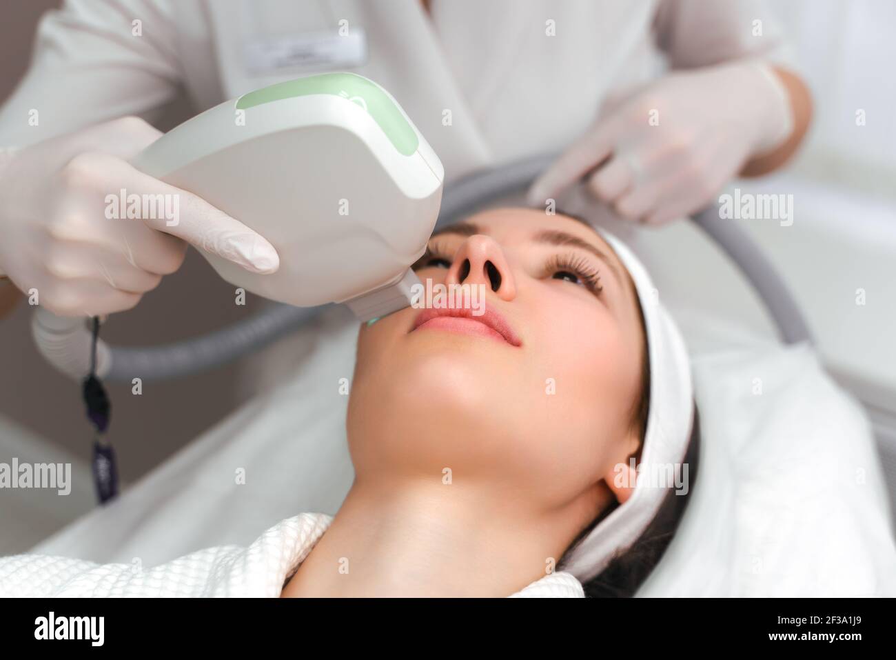 Woman Getting Facial Hydro Microdermabrasion Peeling Treatment At Cosmetic Beauty Spa Clinic. Hydra Vacuum Cleaner. Exfoliation, Rejuvenation And Stock Photo
