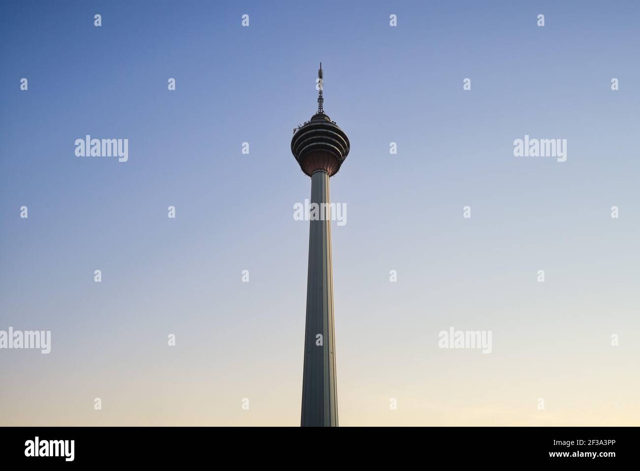 Kuala Lumpur Tower, aka KL tower, in Kuala Lumpur, Malaysia, at dusk Stock Photo