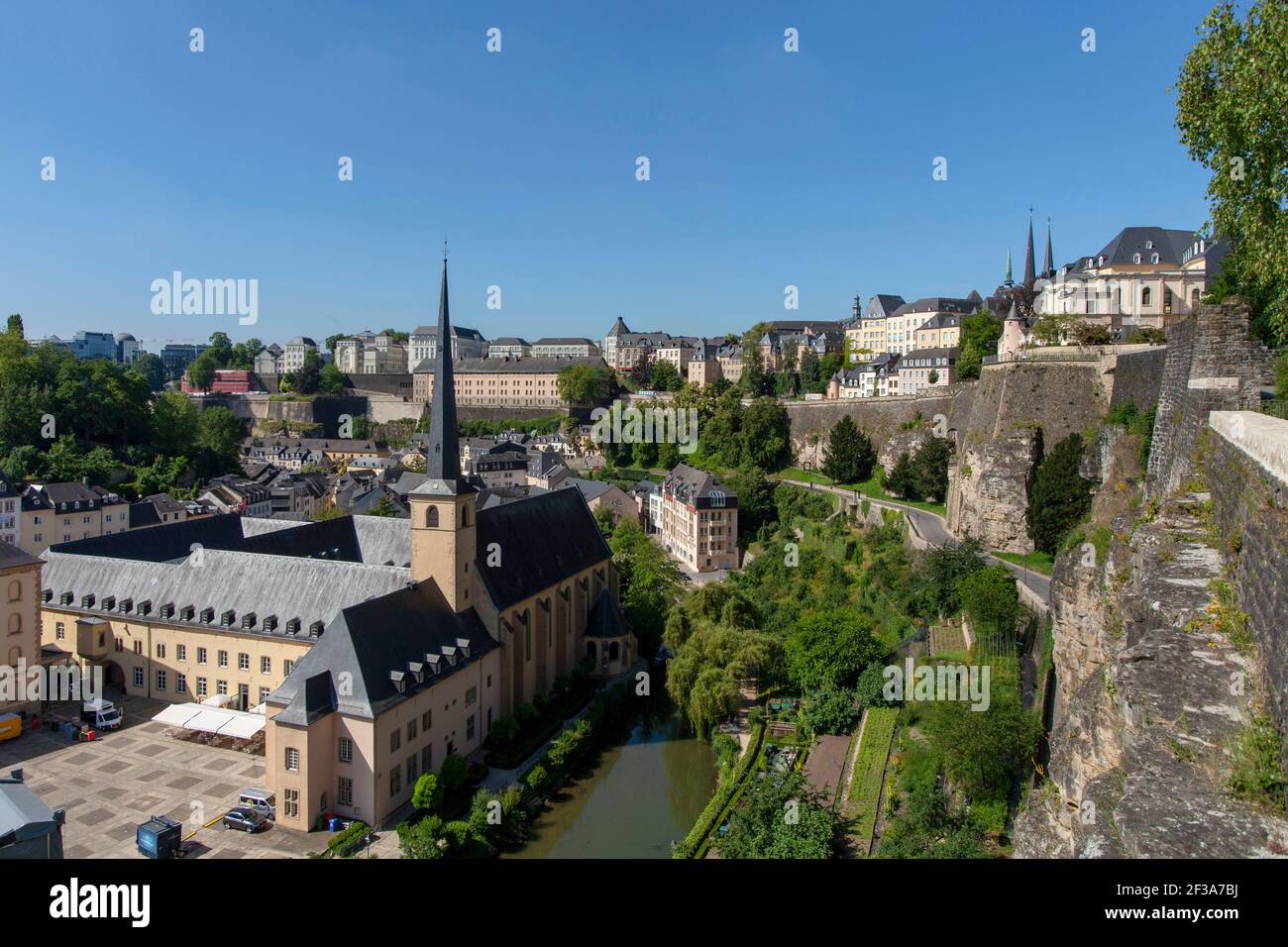 Luxembourg: overview of the city and the former Neumunster Abbey on the banks of the Alzette river in the Old Town, Grund district, abbey converted in Stock Photo