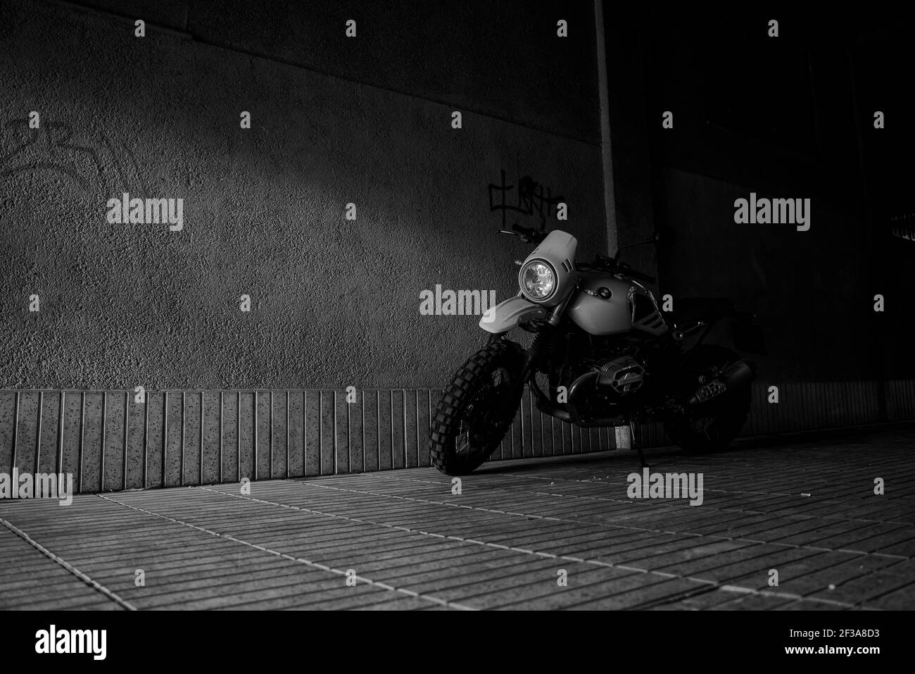 Motorbike parked in the dark Stock Photo