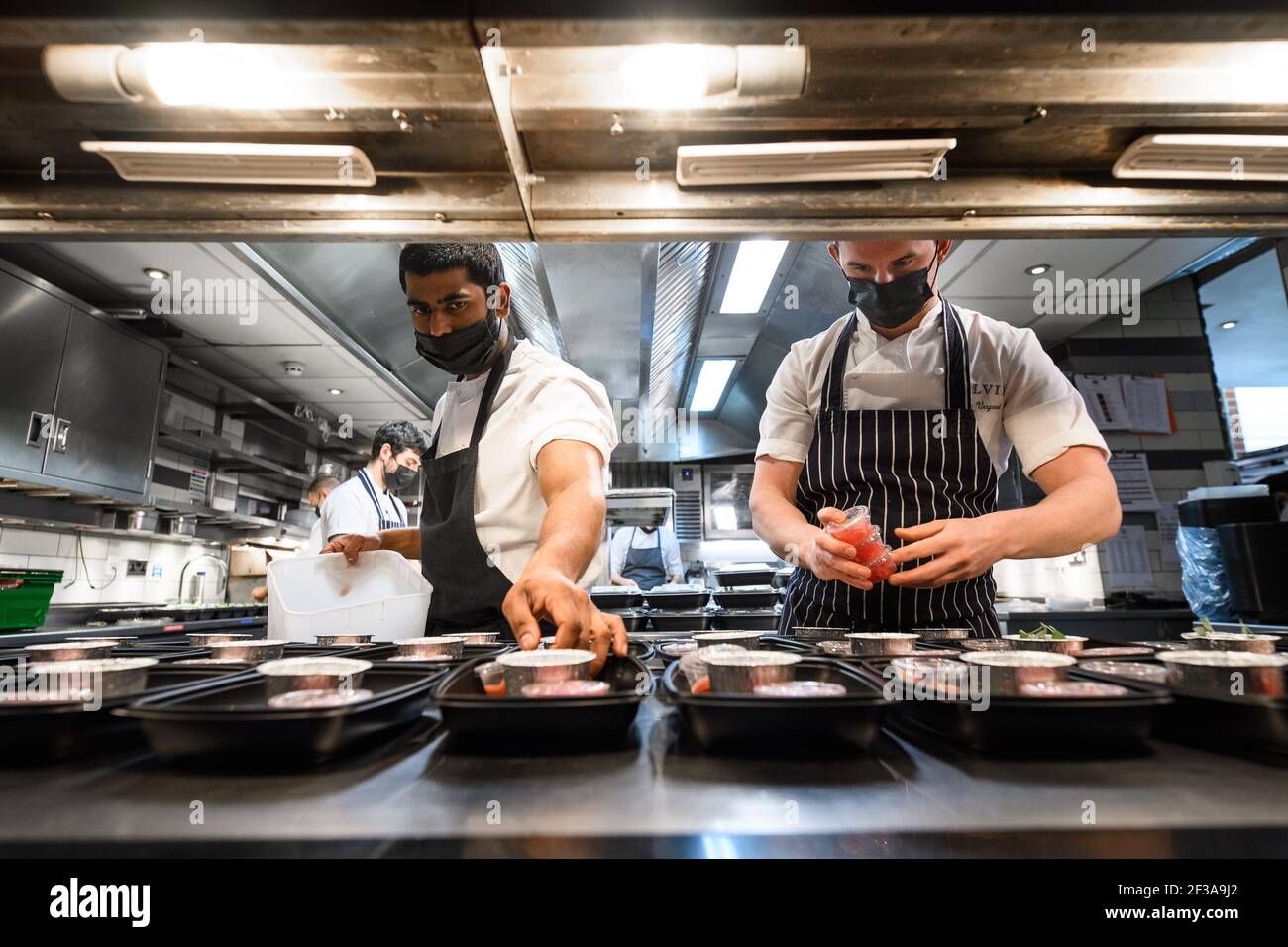 Premium Photo  The chef in the restaurant kitchen prepares