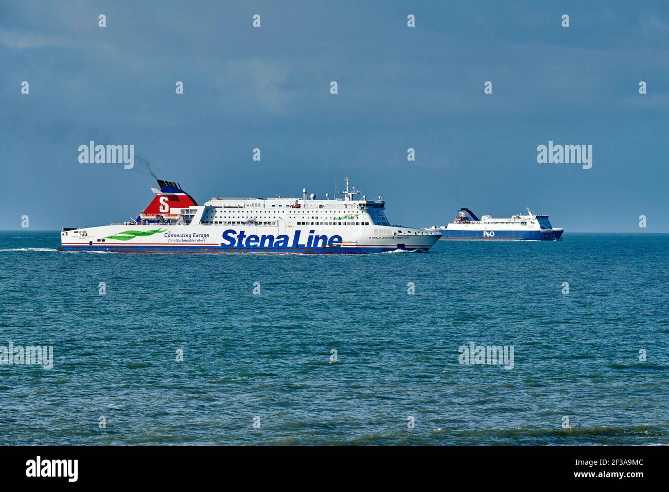 Stena Line and P & O Irish sea ferries passing the northern tip of the Rhinns of Galloway, Scottish coast, en route into Cairnryan, Western Scotland Stock Photo